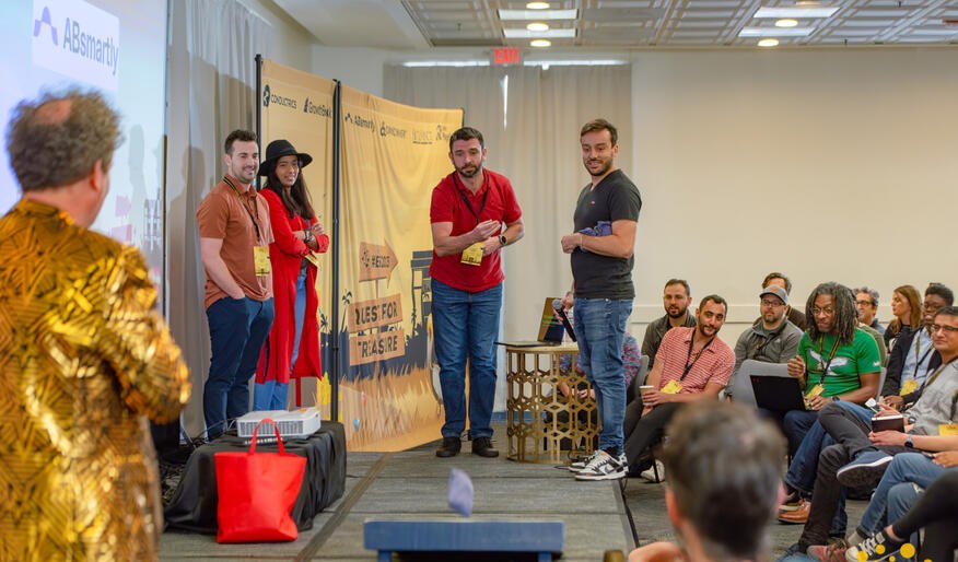 Attendees participating in an interactive session