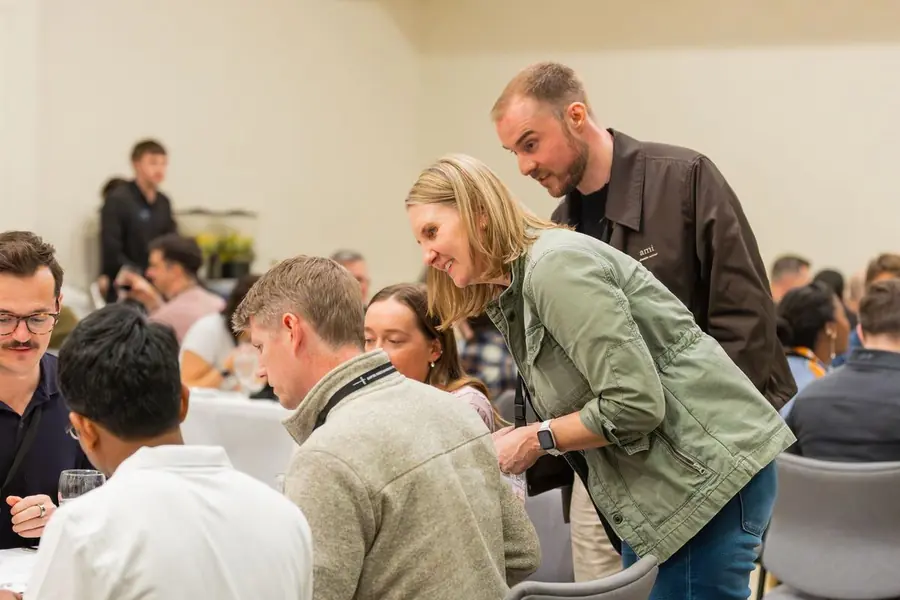 Attendees sharing dinner during the event