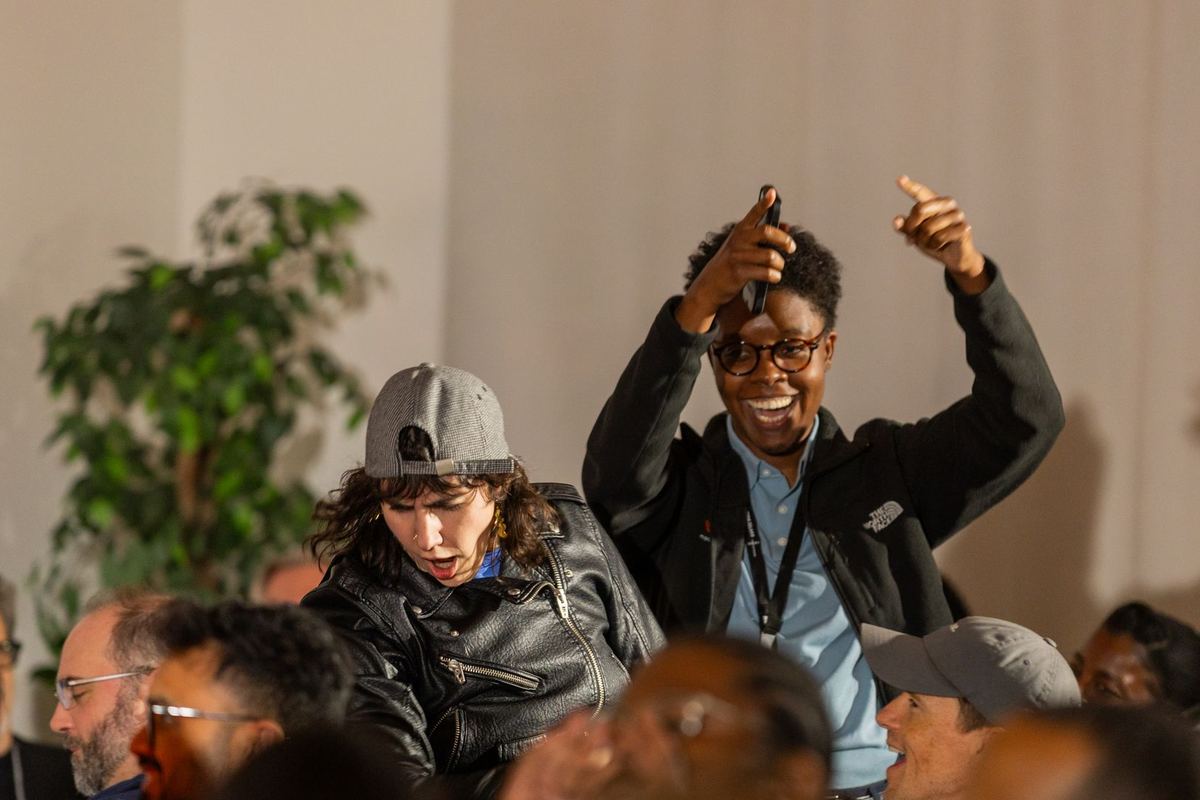 Attendees celebrating together at a previous US event