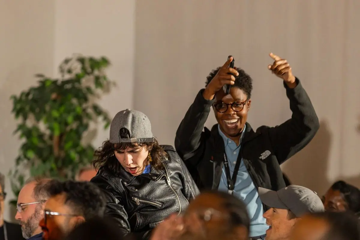 Attendees celebrating together at a previous US event
