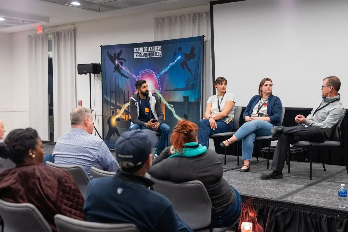 Attendees in a panel discussion at a previous US event